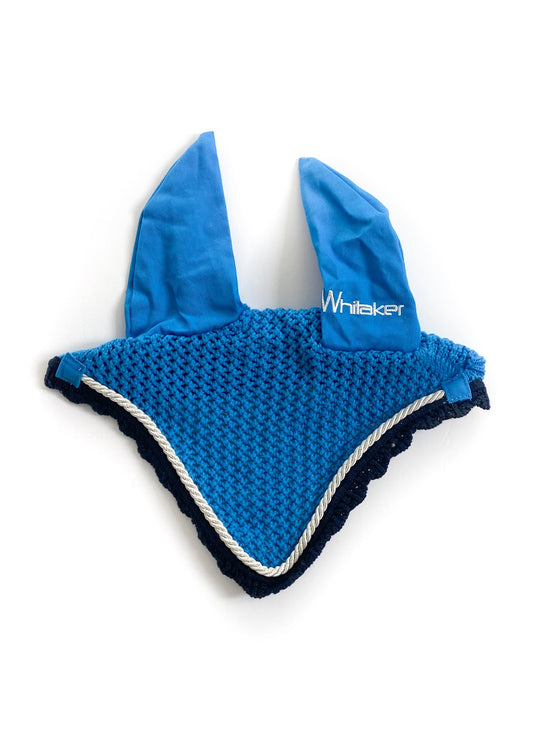 electric blue bonnet with Whitaker embroidered on ear.
